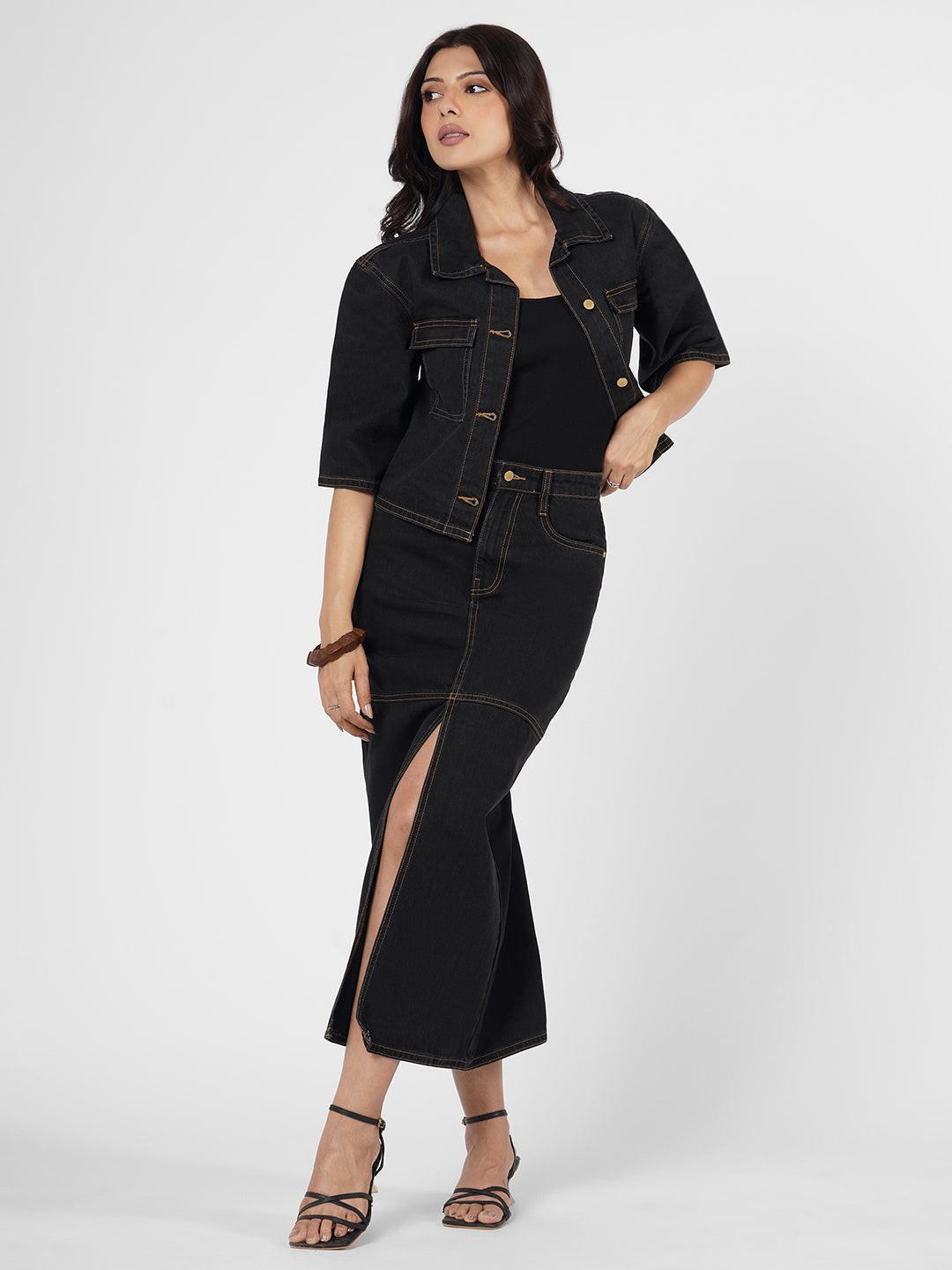 Woman wearing a dark denim Shacket by Rerasa