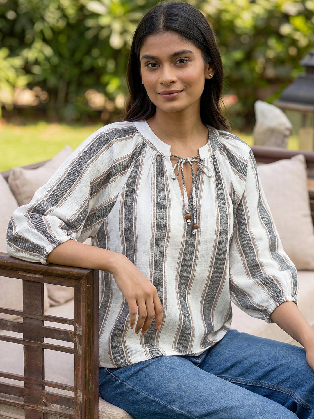 Woman wearing a striped blouse  by rerasa