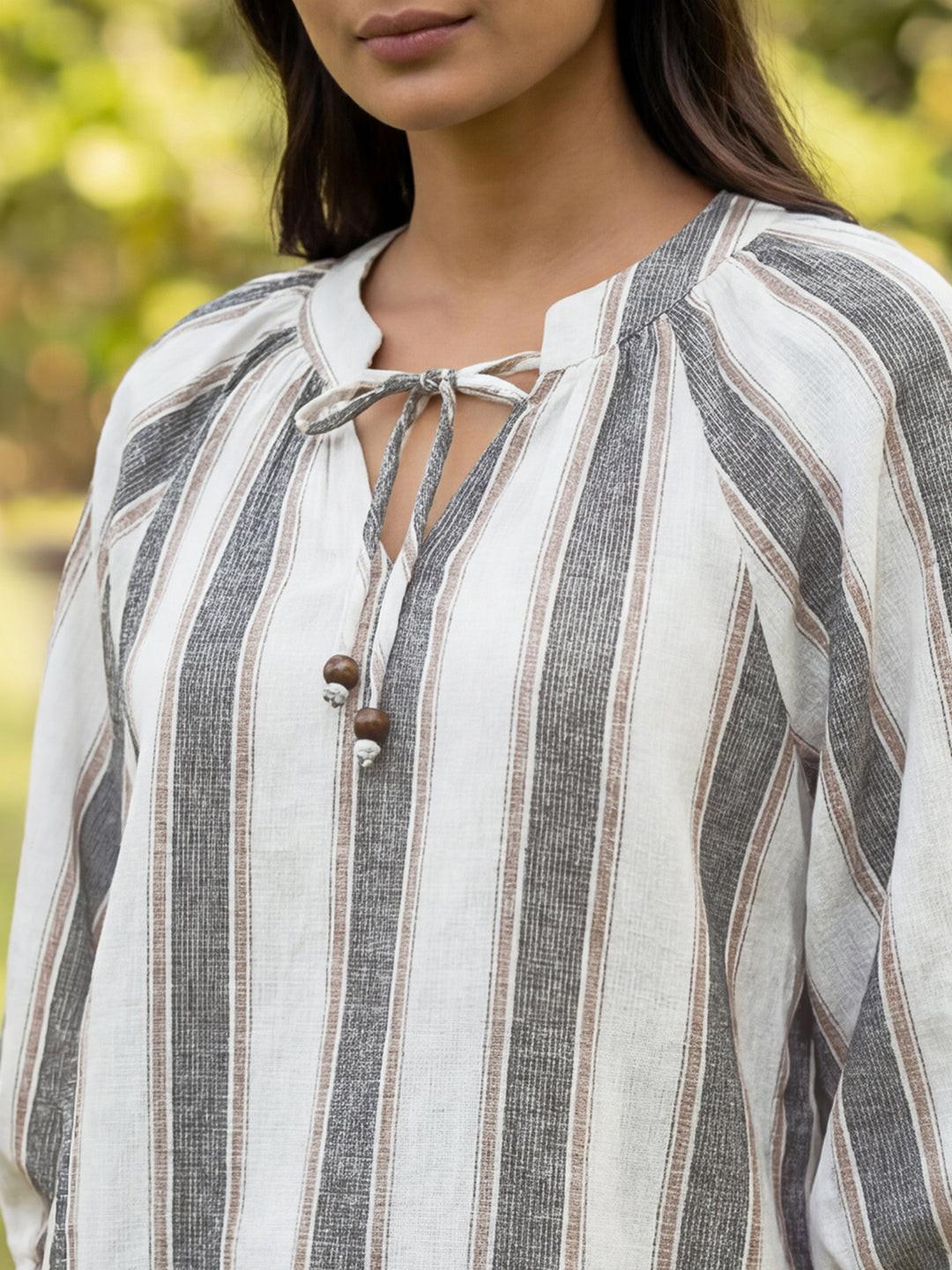Close up of Woman wearing a striped blouse 