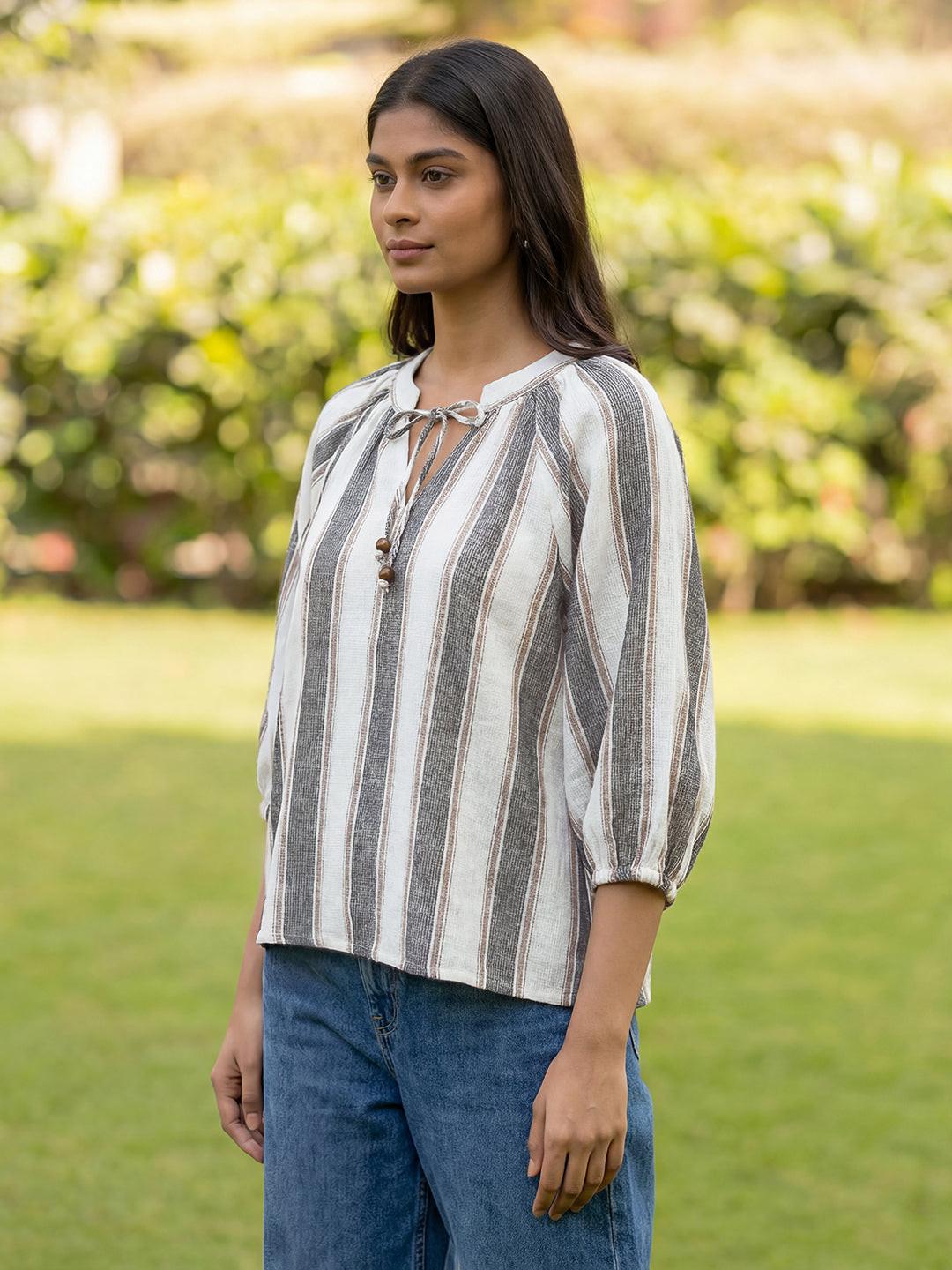 Woman wearing a striped top by Rerasa