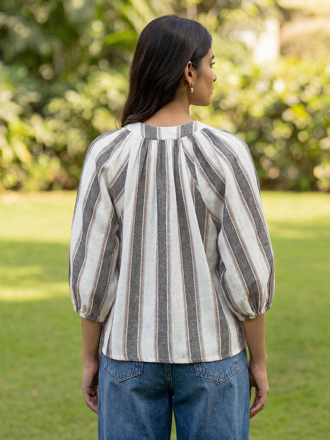 Women wearing a striped blouse by Rerasa