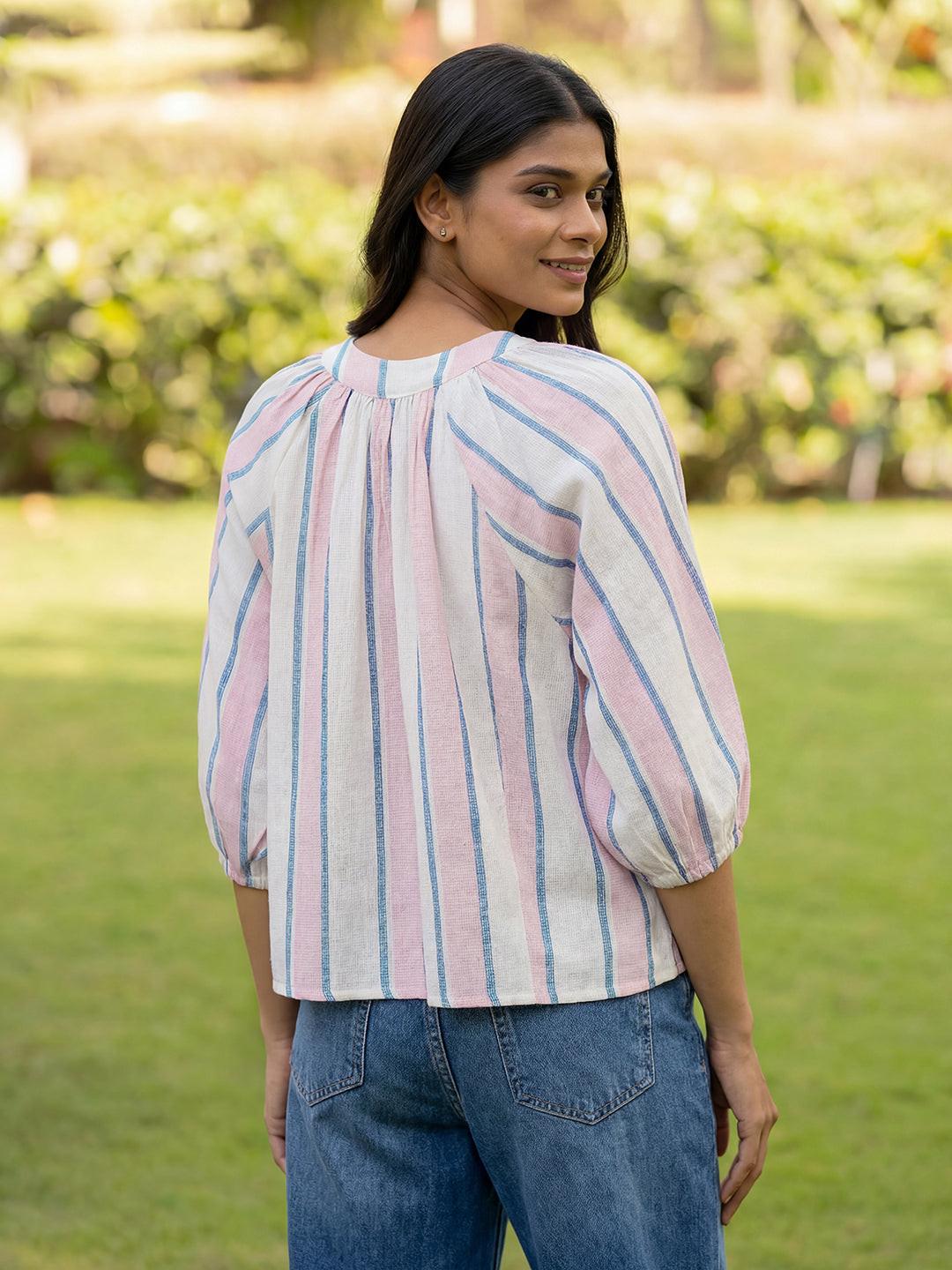 Woman wearing a striped blouse  by rerasa