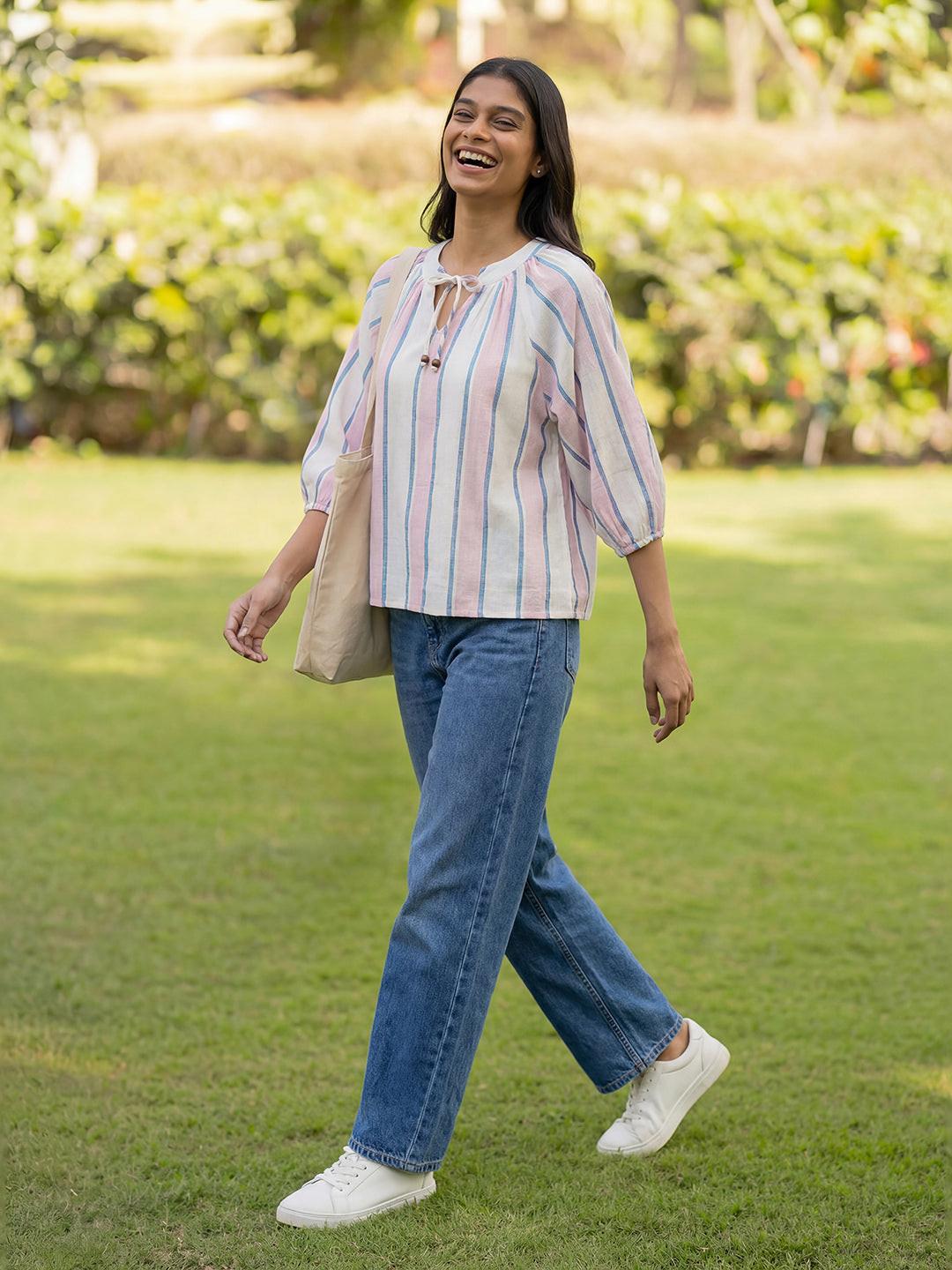 Woman wearing a striped blouse  by rerasa