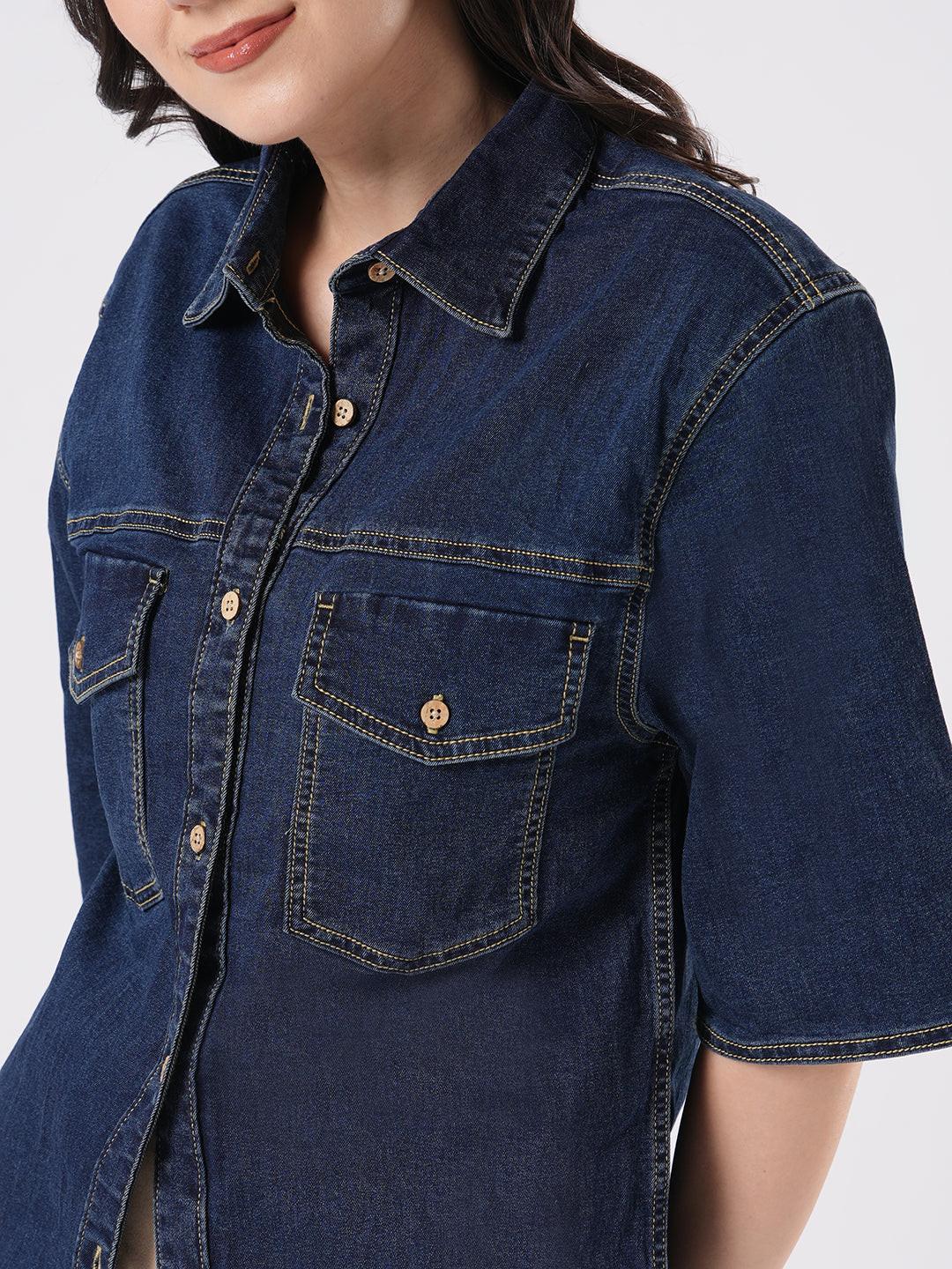 Woman wearing a dark blue denim shirt by Rerasa