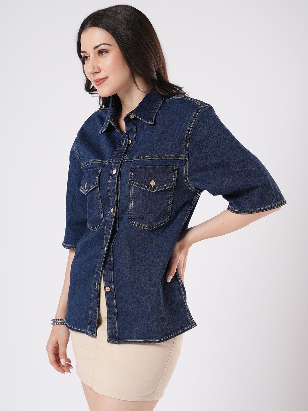 Woman wearing a dark blue denim shirt by Rerasa
