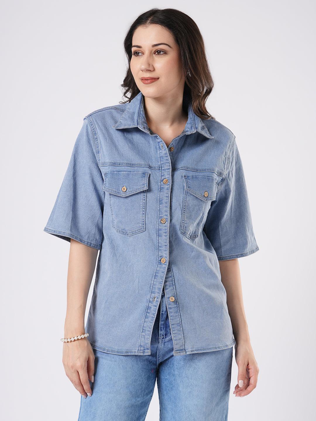 Woman wearing a light blue denim shirt by Rerasa