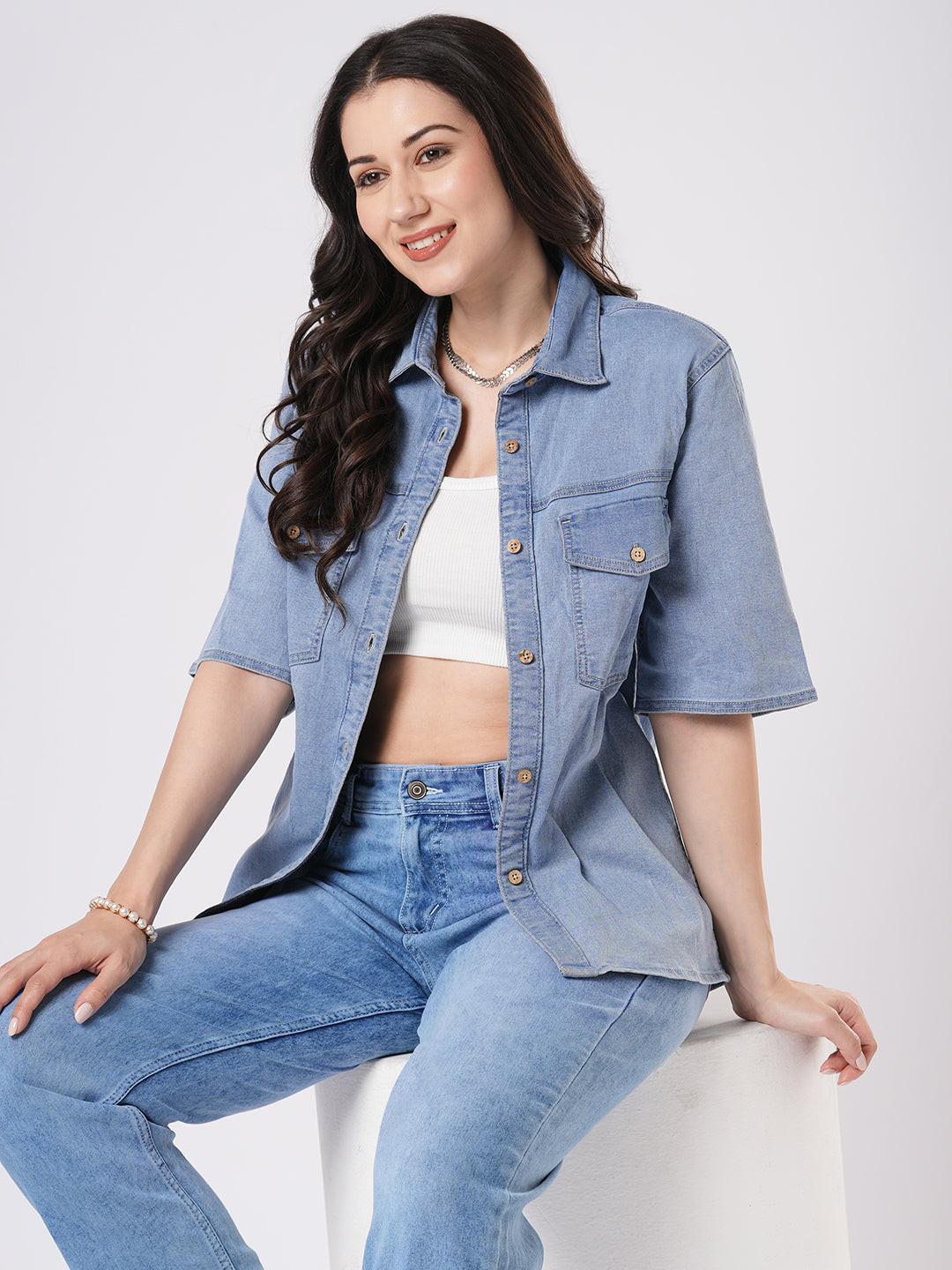 Woman wearing a light blue denim shirt by Rerasa
