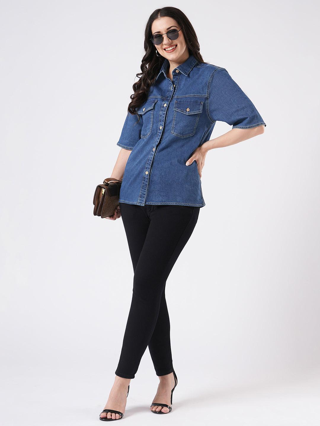 Woman wearing a mid blue denim shirt by Rerasa
