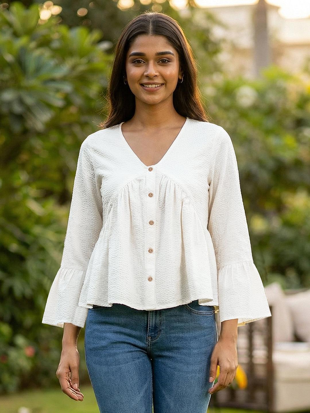 Woman wearing a White blouse with ruffled sleeves by Rerasa