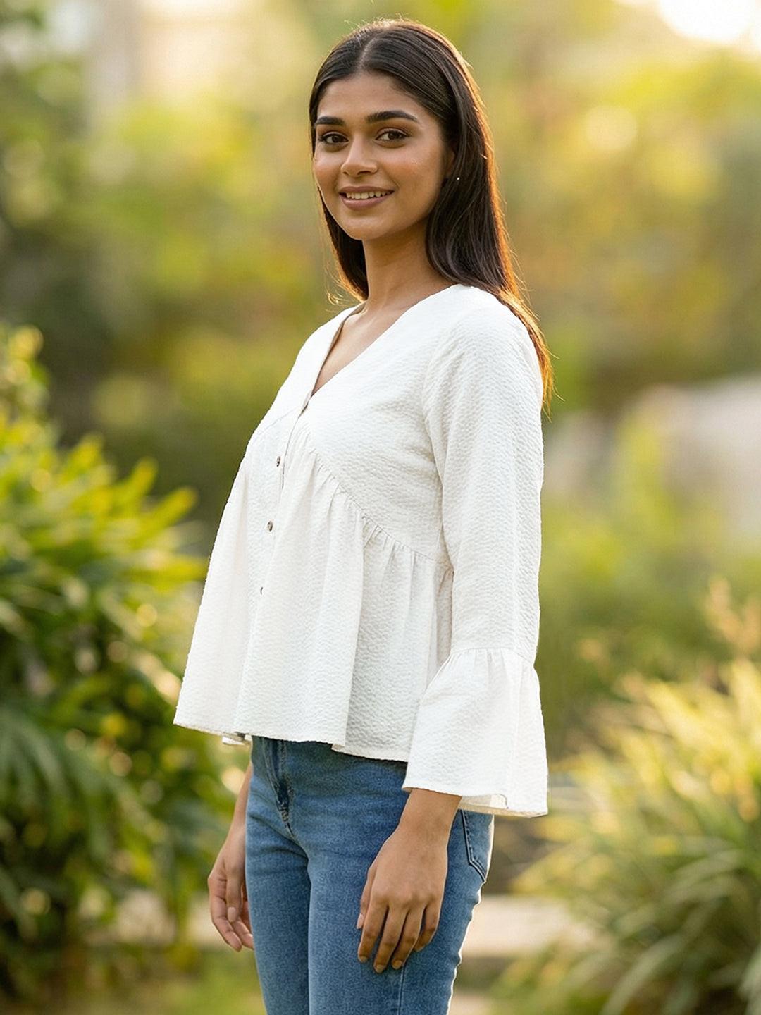 Woman wearing a White blouse with ruffled sleeves by Rerasa
