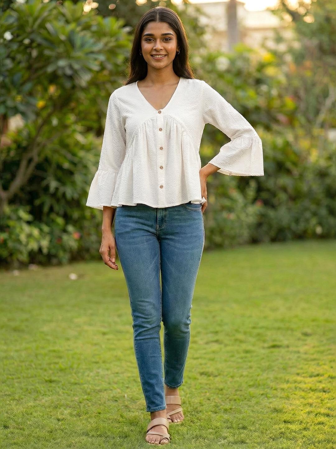 Woman wearing a White blouse with ruffled sleeves by Rerasa