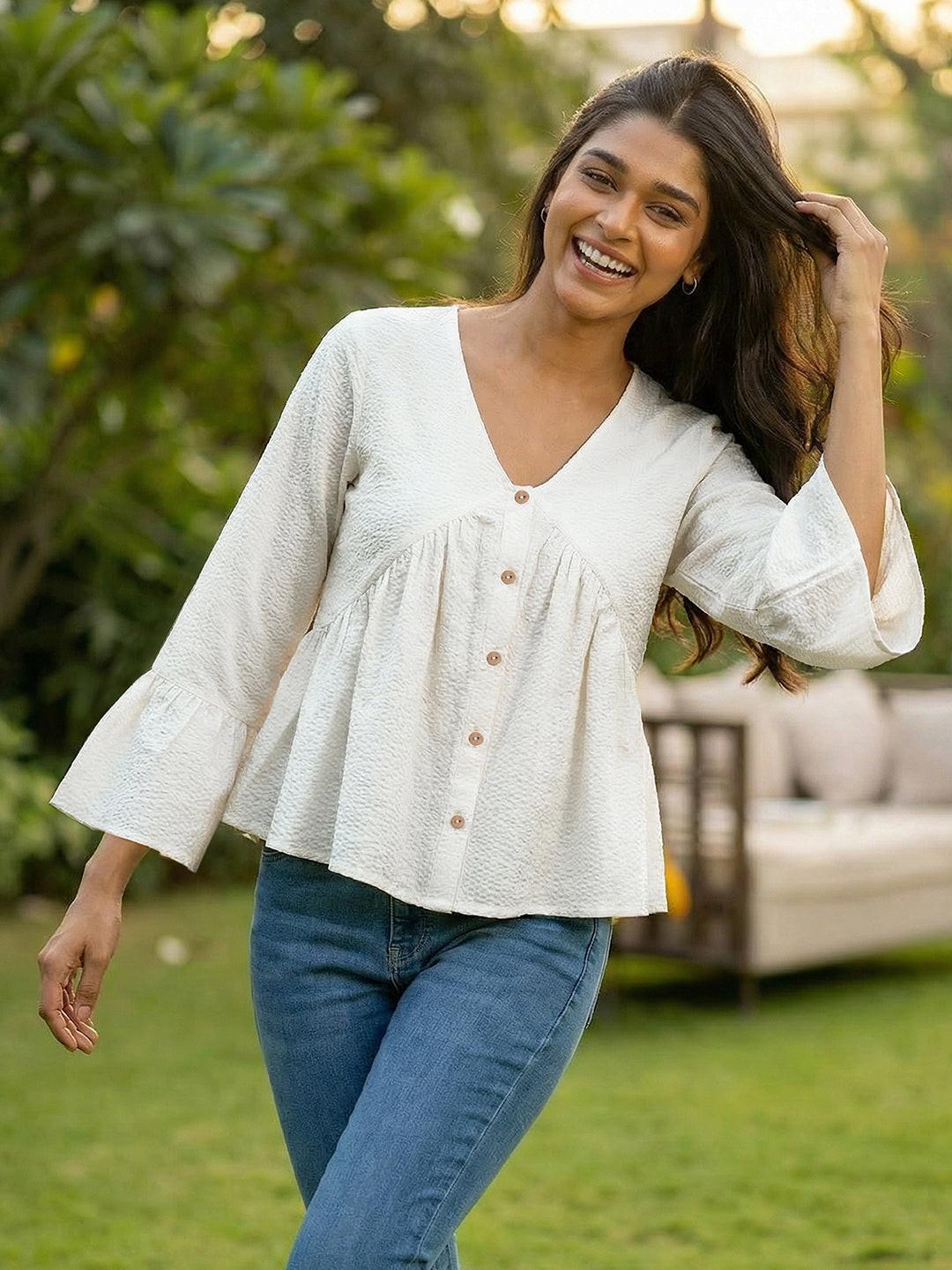 Woman wearing a White blouse with ruffled sleeves by Rerasa