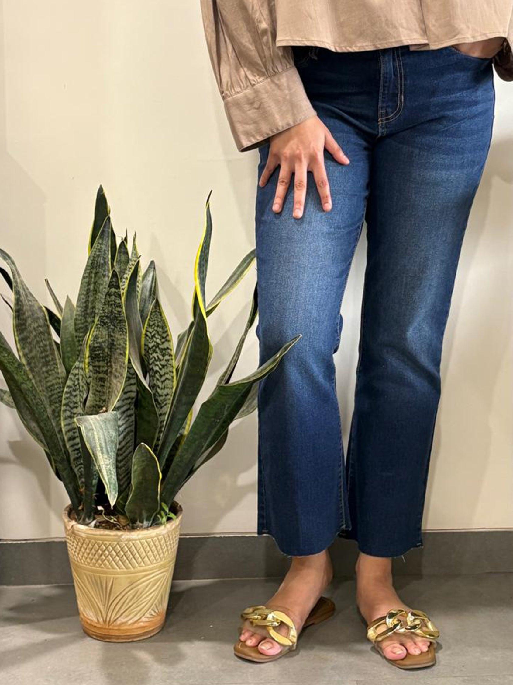 Dark  blue jeans worn by a person From Rerasa