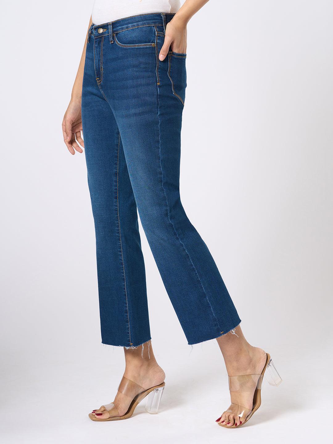 Dark  blue jeans worn by a person From Rerasa