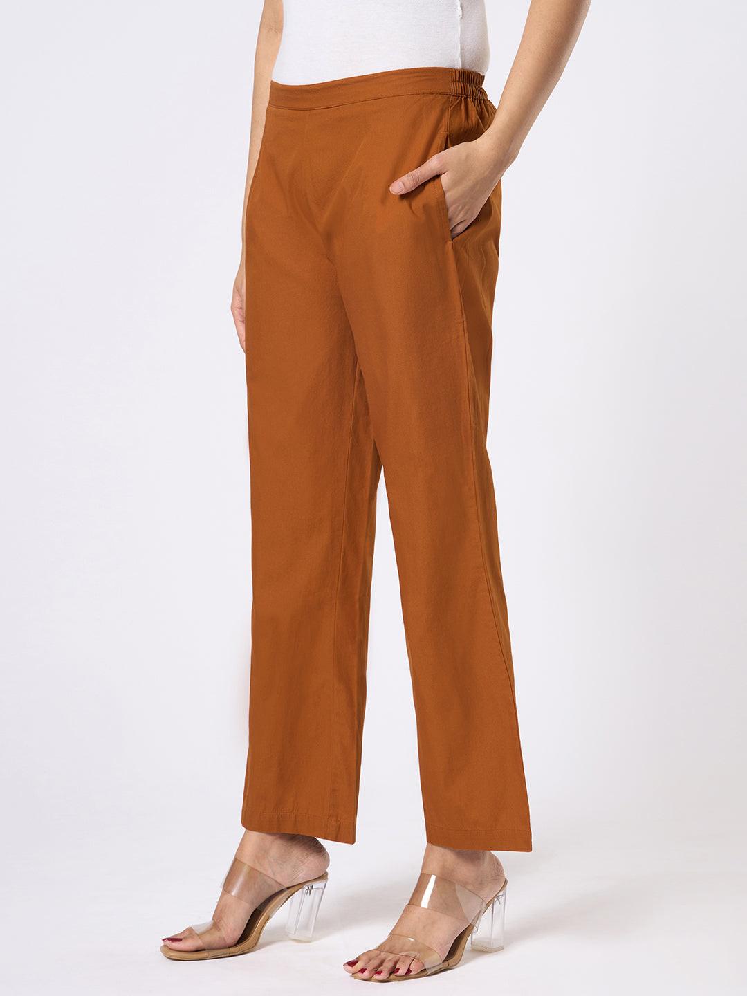 Brown wide-leg pants worn by Rerasa