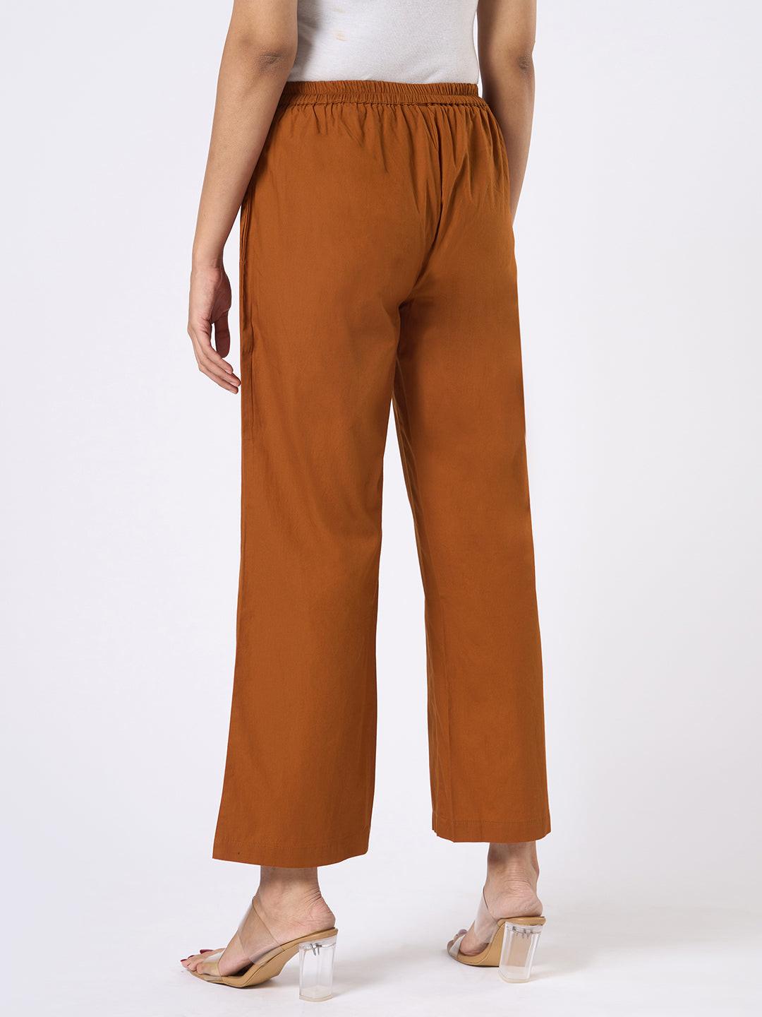 Brown wide-leg pants worn by Rerasa