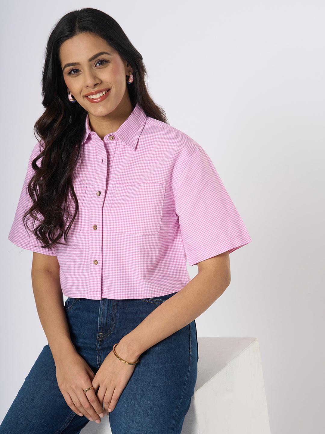 Woman wearing a gingham checkered crop top by Rerasa