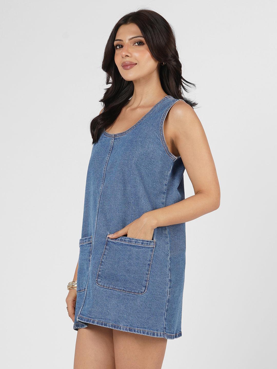 Blue denim dress worn by model