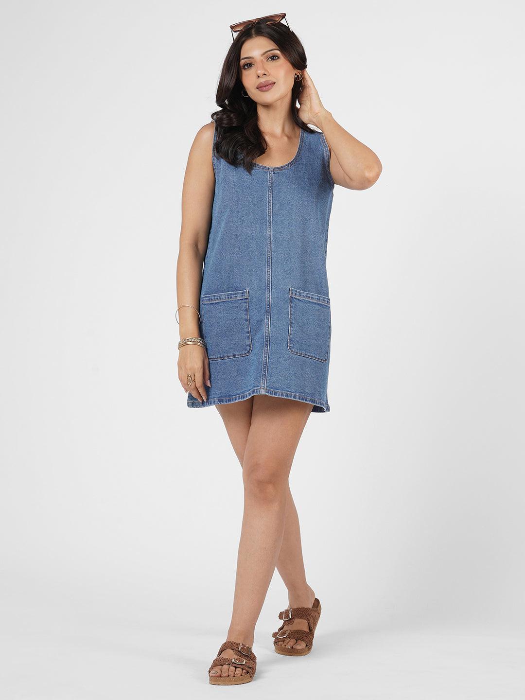 Blue denim dress worn by model
