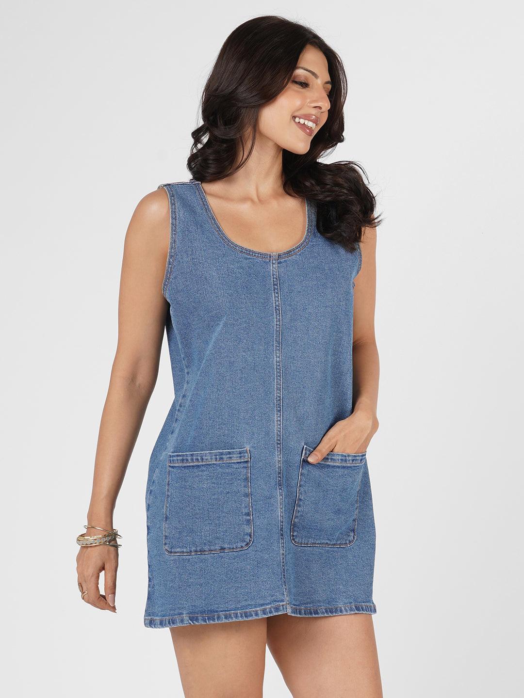 Blue denim dress worn by model