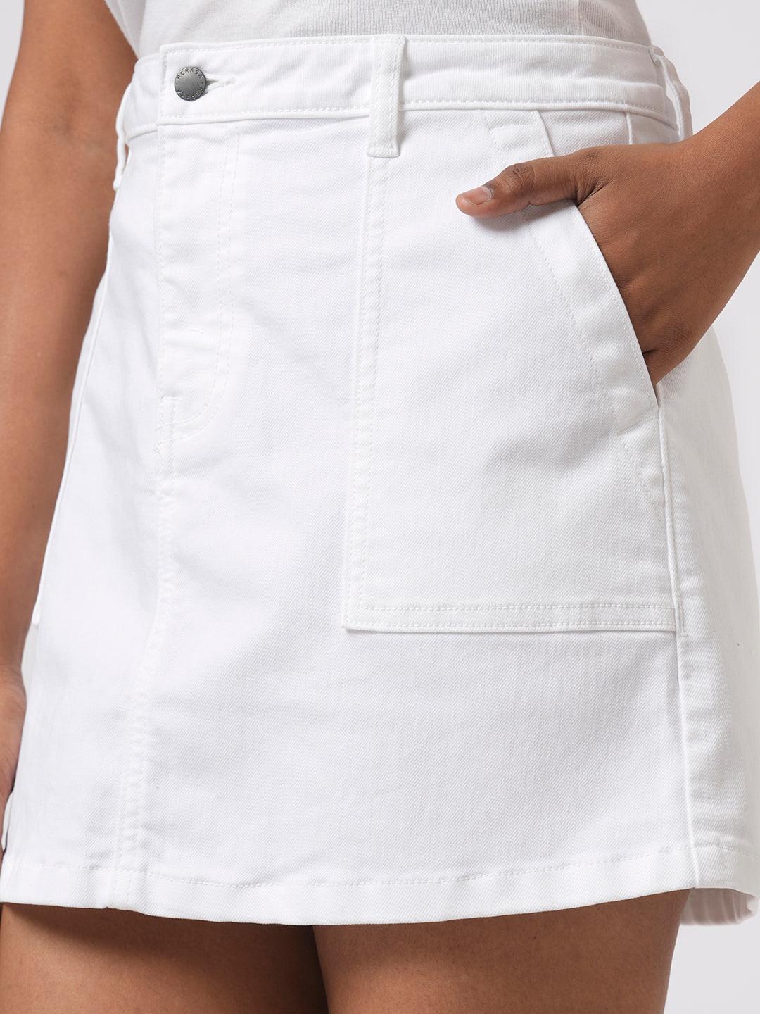 Person wearing a white denim skirt by Rerasa