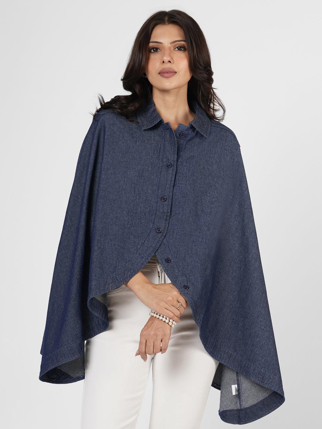 Woman wearing a blue poncho over  by Rerasa