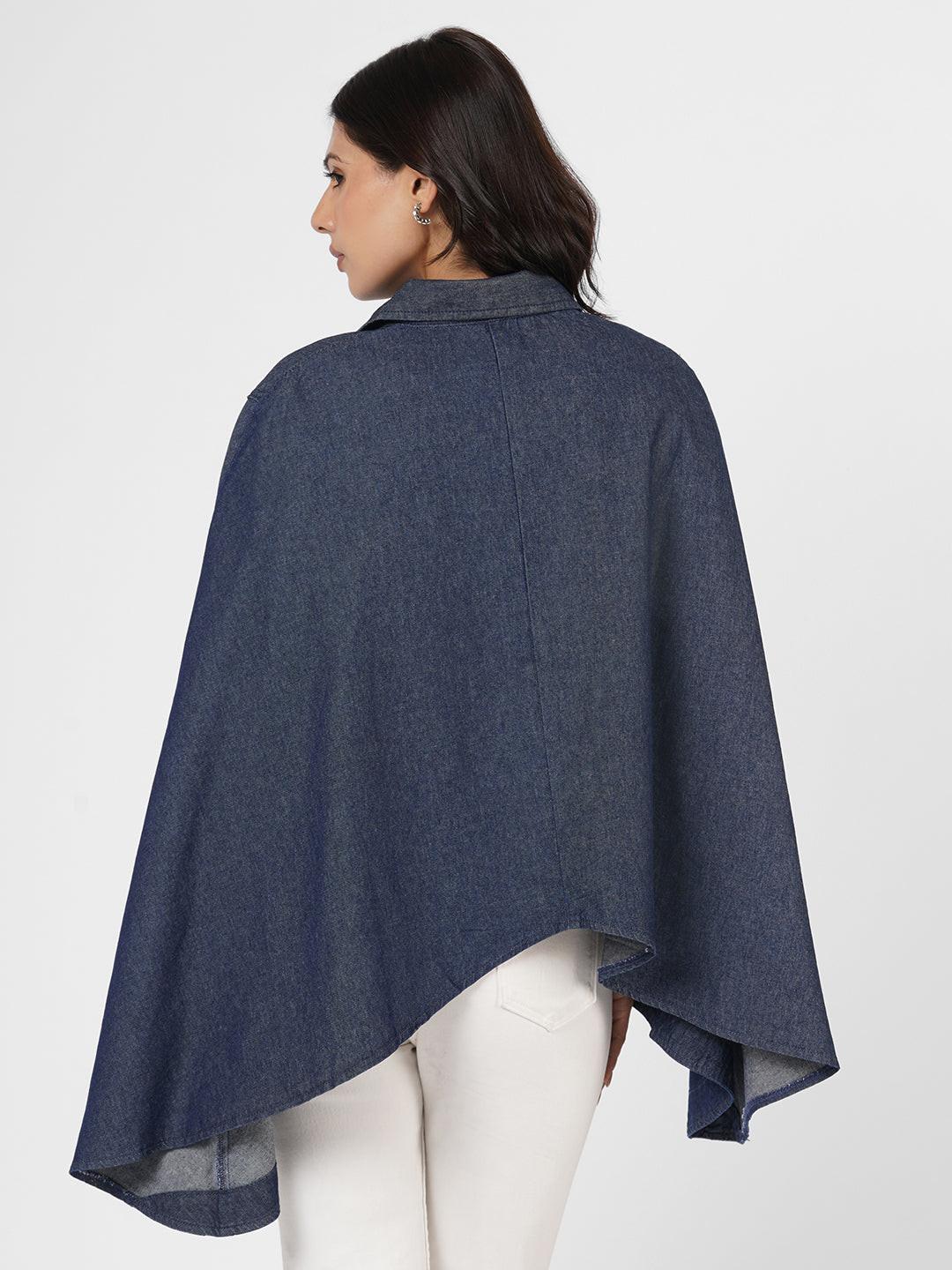 Woman wearing a blue poncho over  by Rerasa