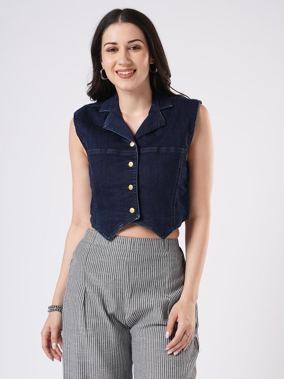 Woman wearing a denim vest by Reasa