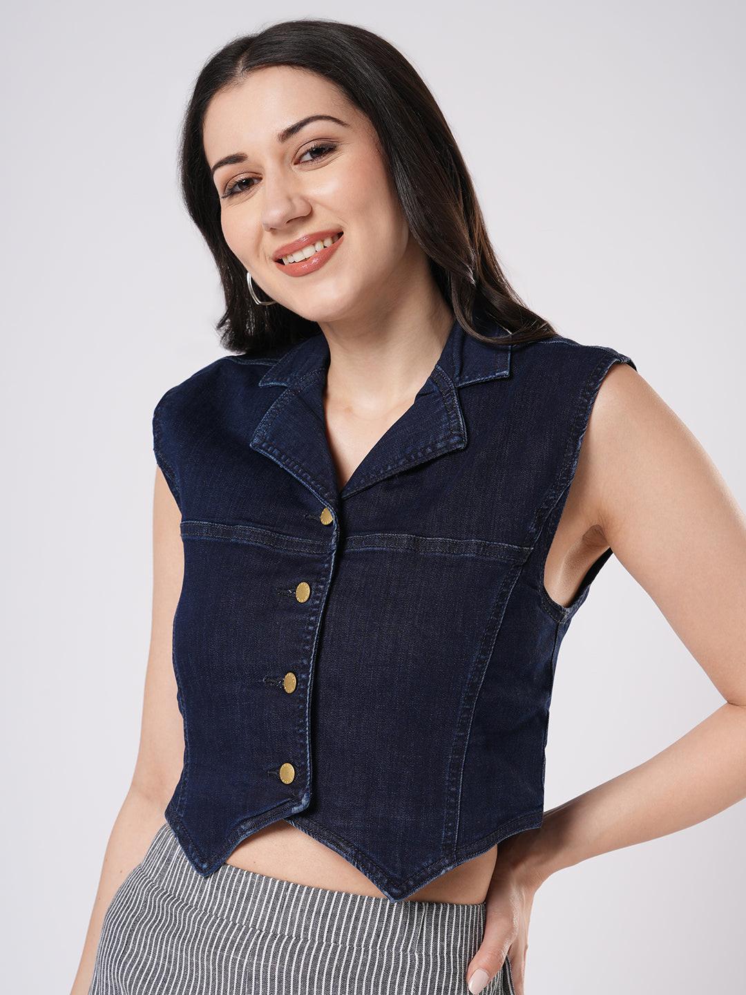 Woman wearing a denim vest by Reasa