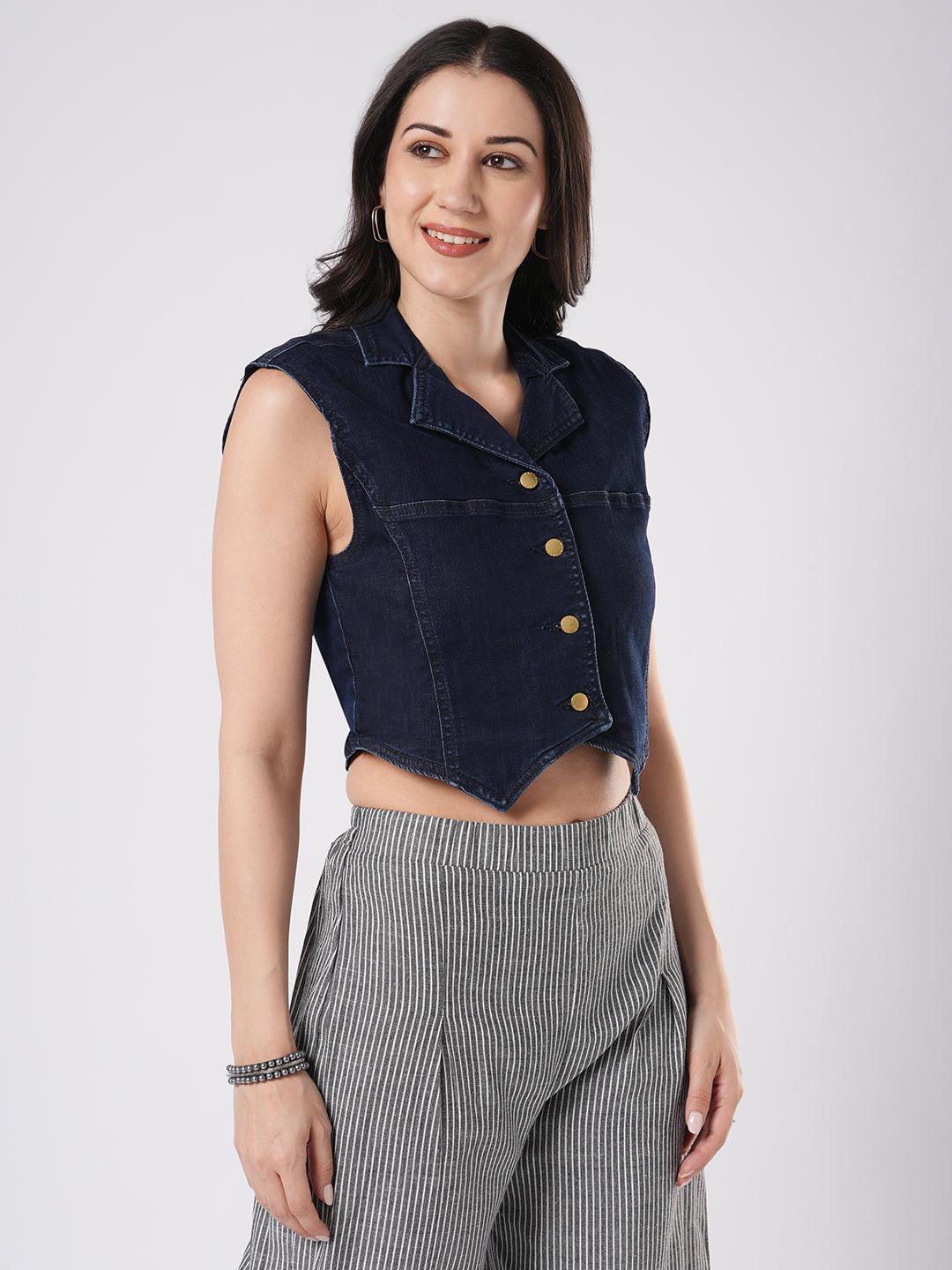 Woman wearing a denim vest by Reasa