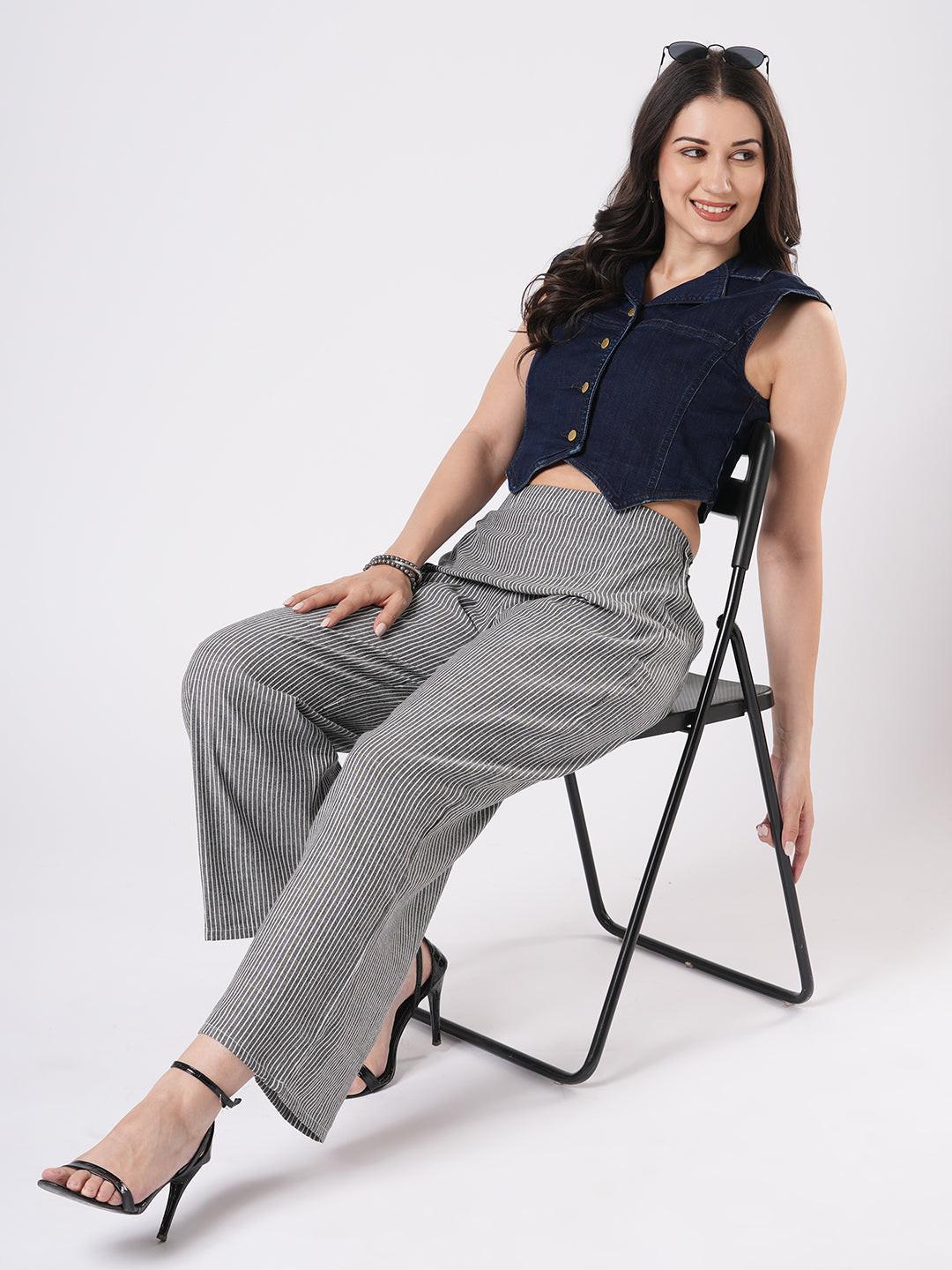 Woman wearing a denim vest by Reasa