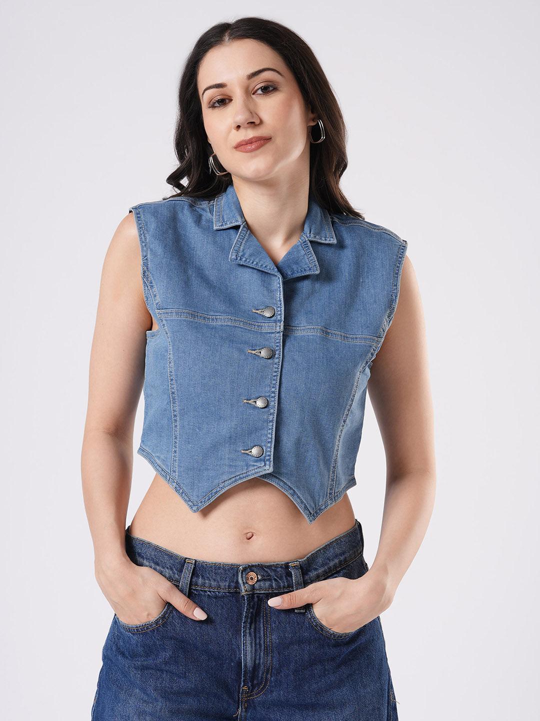 Woman wearing a denim vest by Reasa