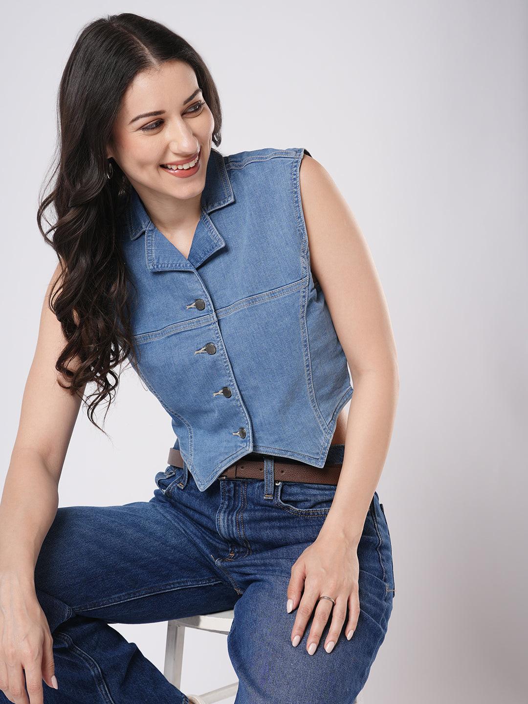 Woman wearing a denim vest by Reasa