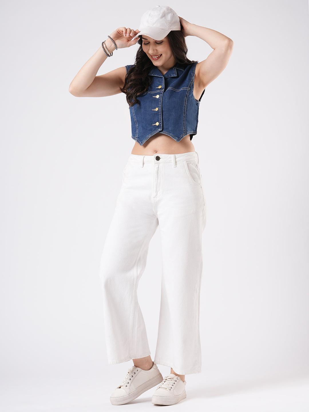 Woman wearing a denim vest by Reasa