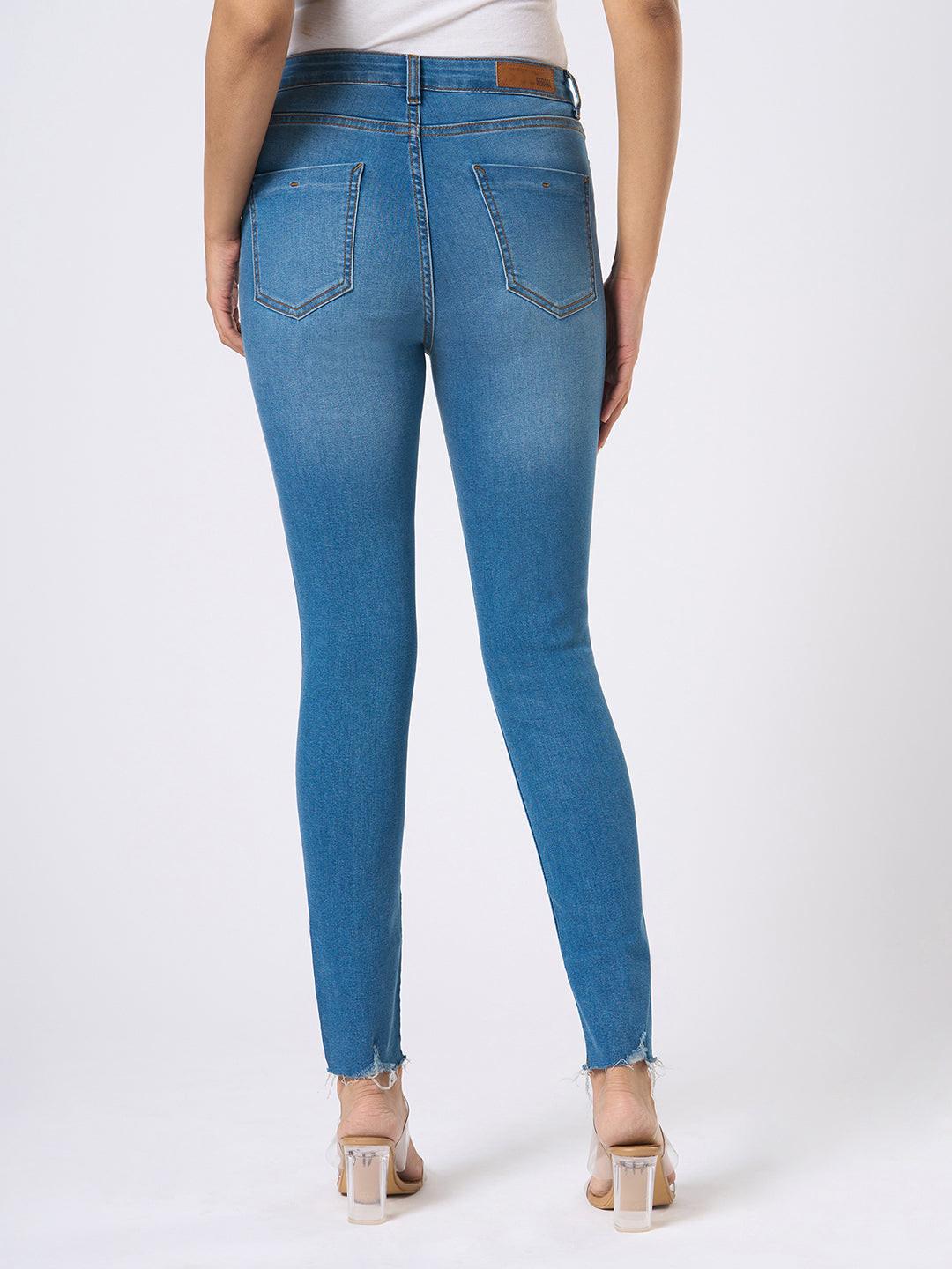 Rerasa Blue jeans worn by a person on a white background