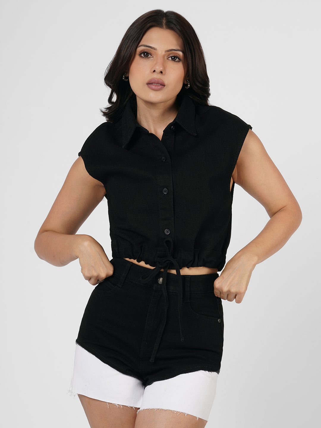 
Person wearing black denim shorts by Rerasa