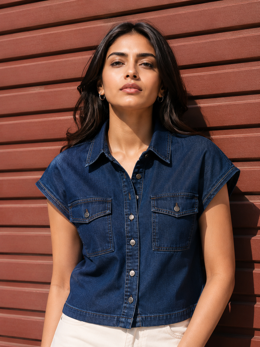 Woman wearing a blue denim shirt by Rerasa