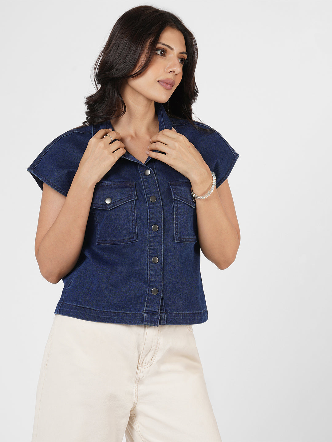 Woman wearing a blue denim shirt by Rerasa