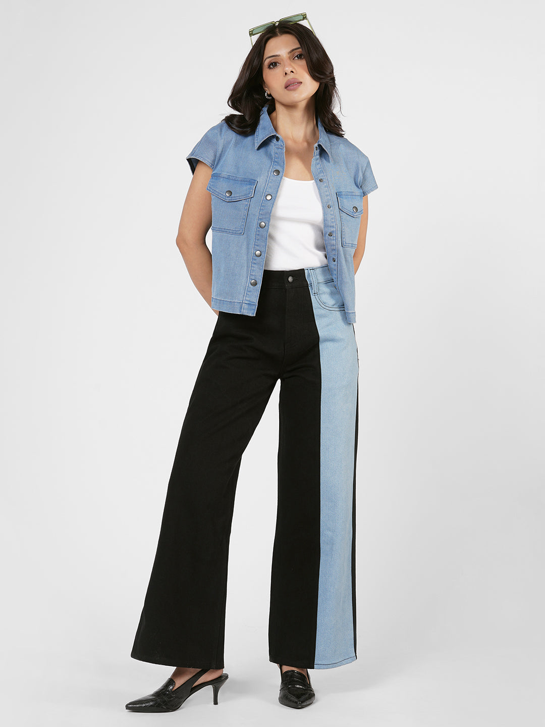 Woman wearing a blue denim shirt by Rerasa
