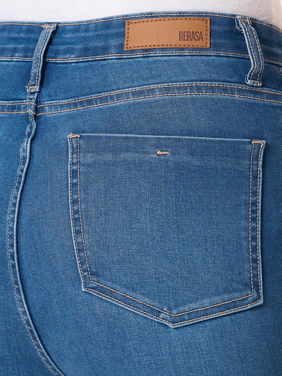 Woman wearing blue flared jeans  by Rerasa