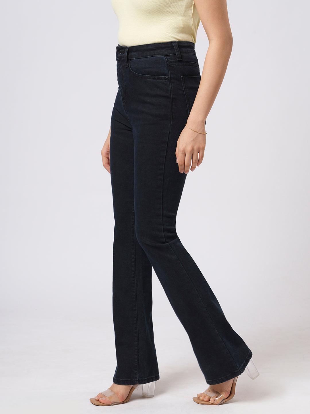 Woman wearing blue flared jeans  by Rerasa