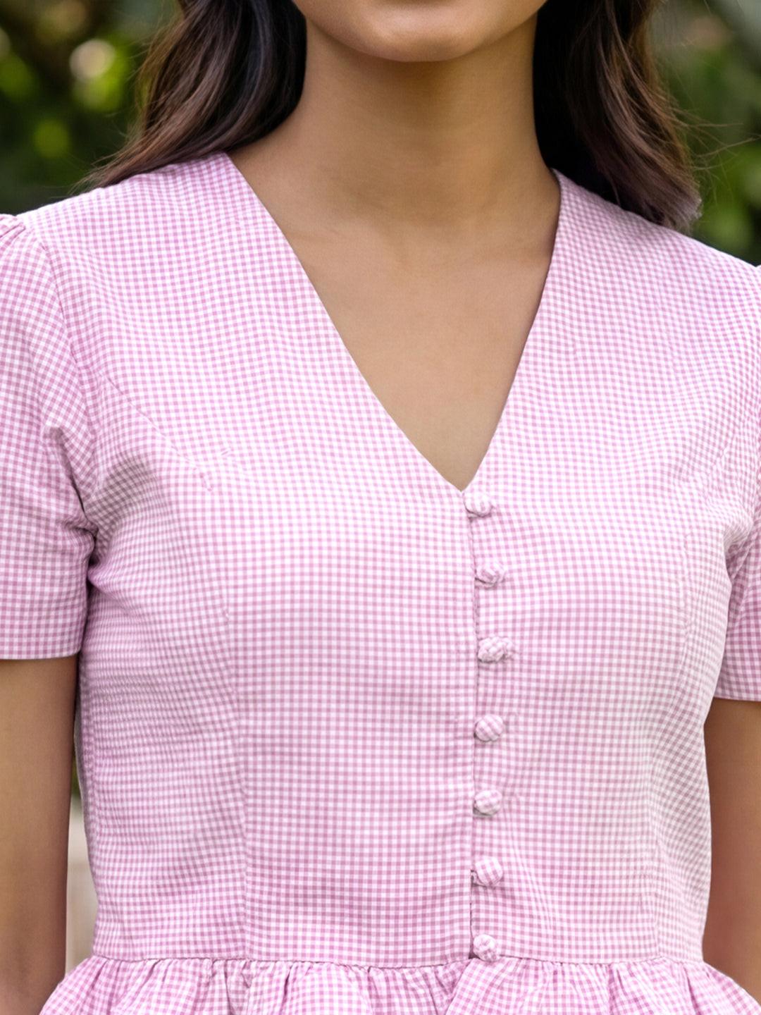 Woman wearing a pink crop top by Rerasa