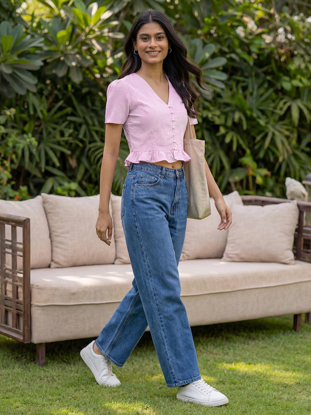Woman wearing a pink crop top by Rerasa
