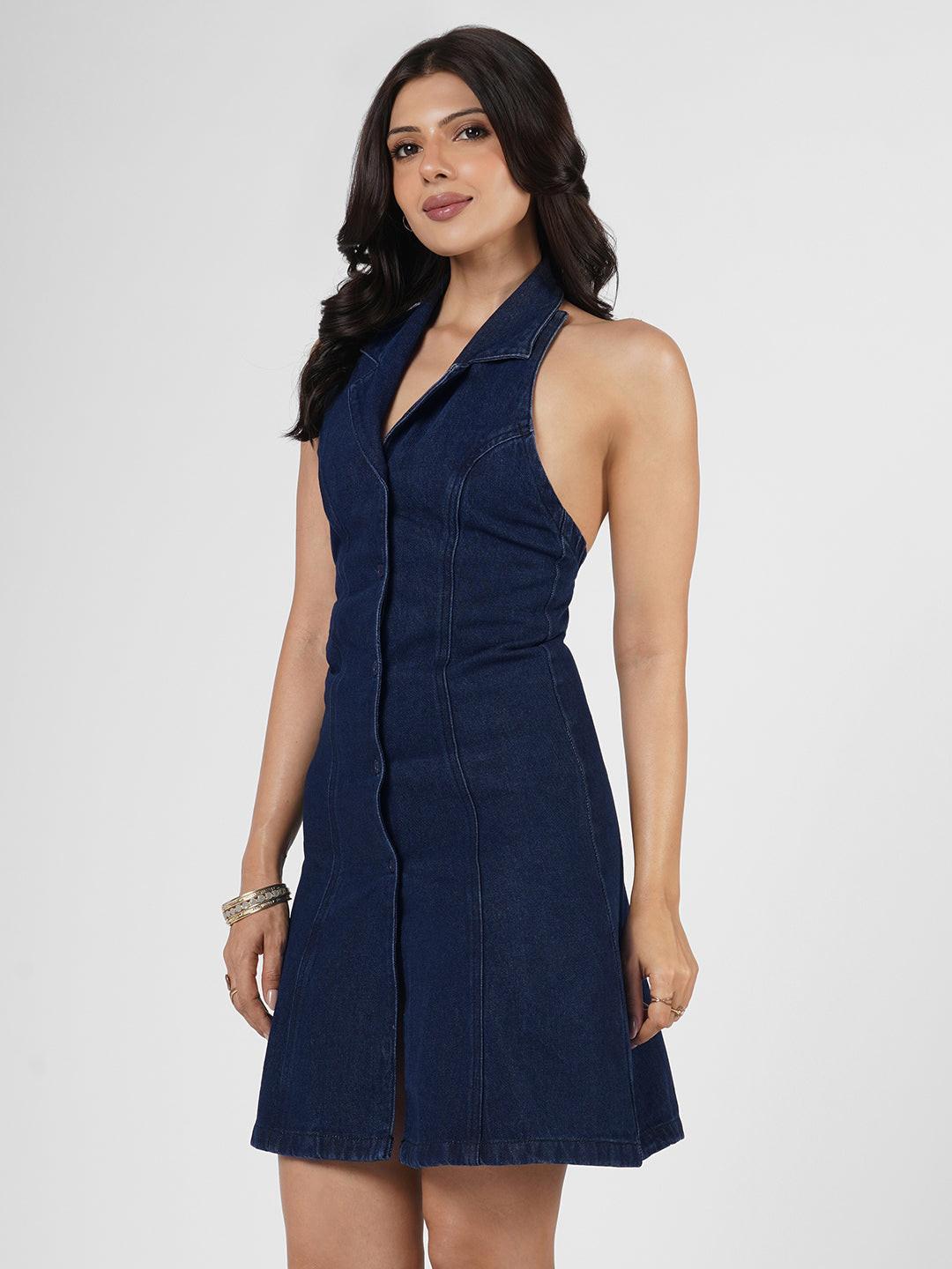 Woman wearing a blue  denim dress 