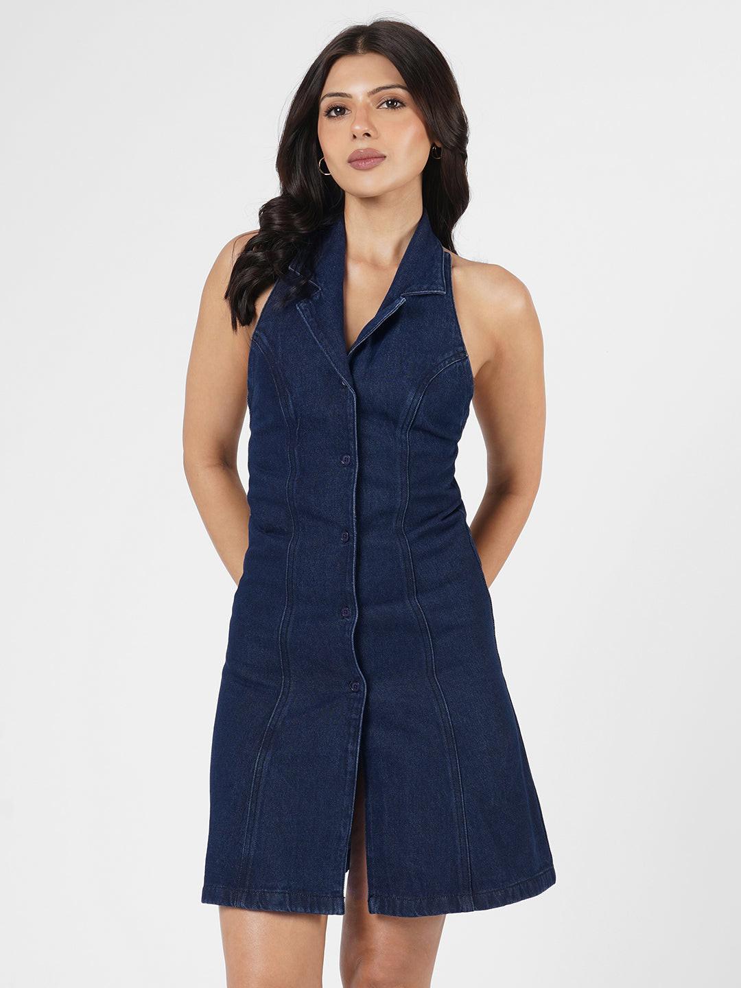 Woman wearing a blue  denim dress 