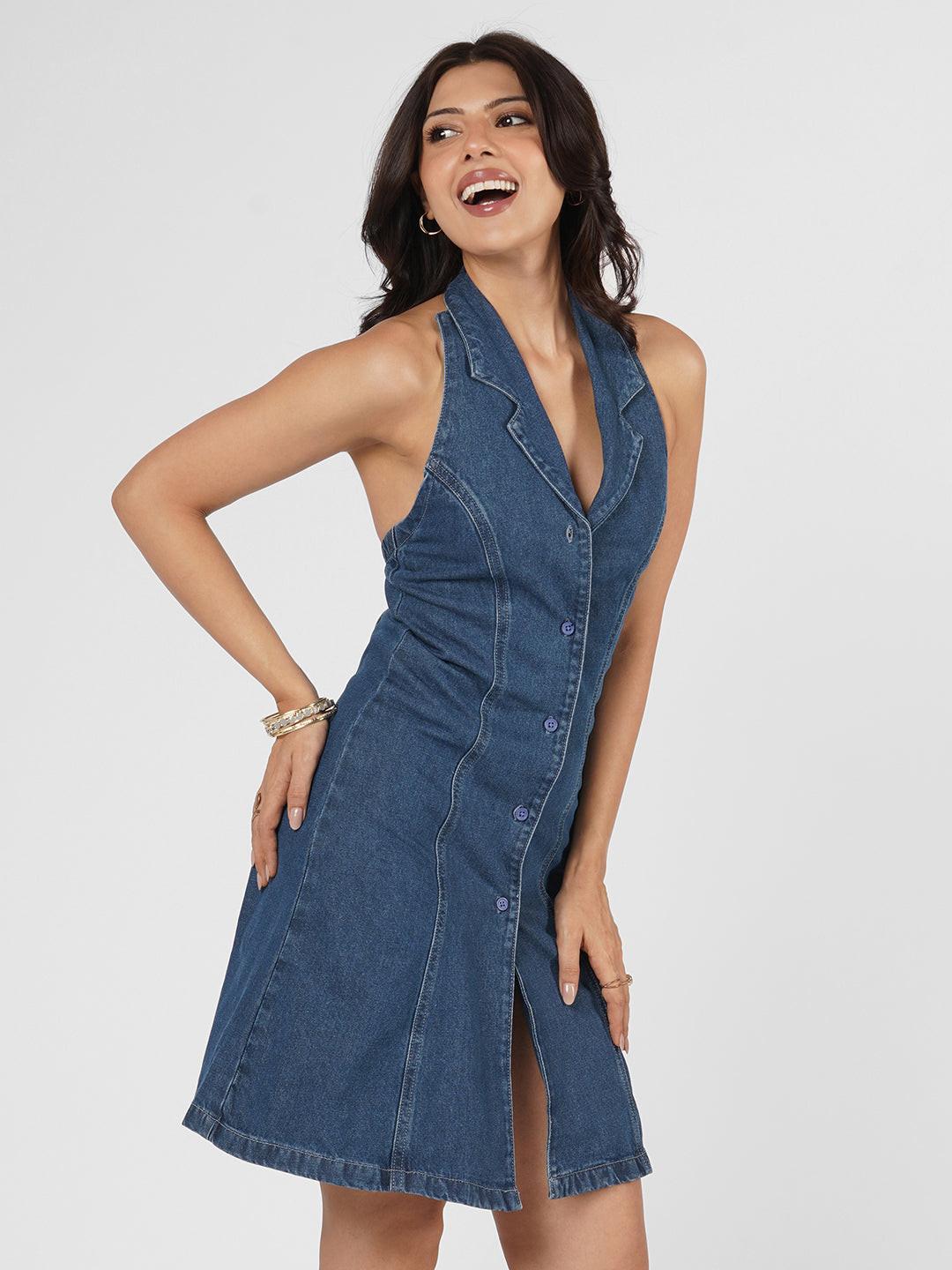 Woman wearing a blue  denim dress 