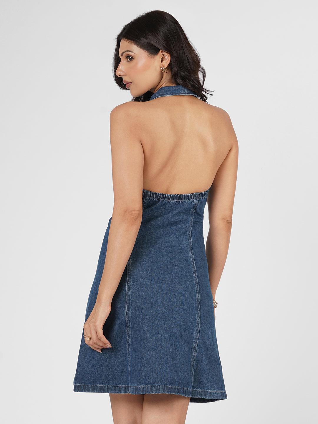 Woman wearing a blue  denim dress 