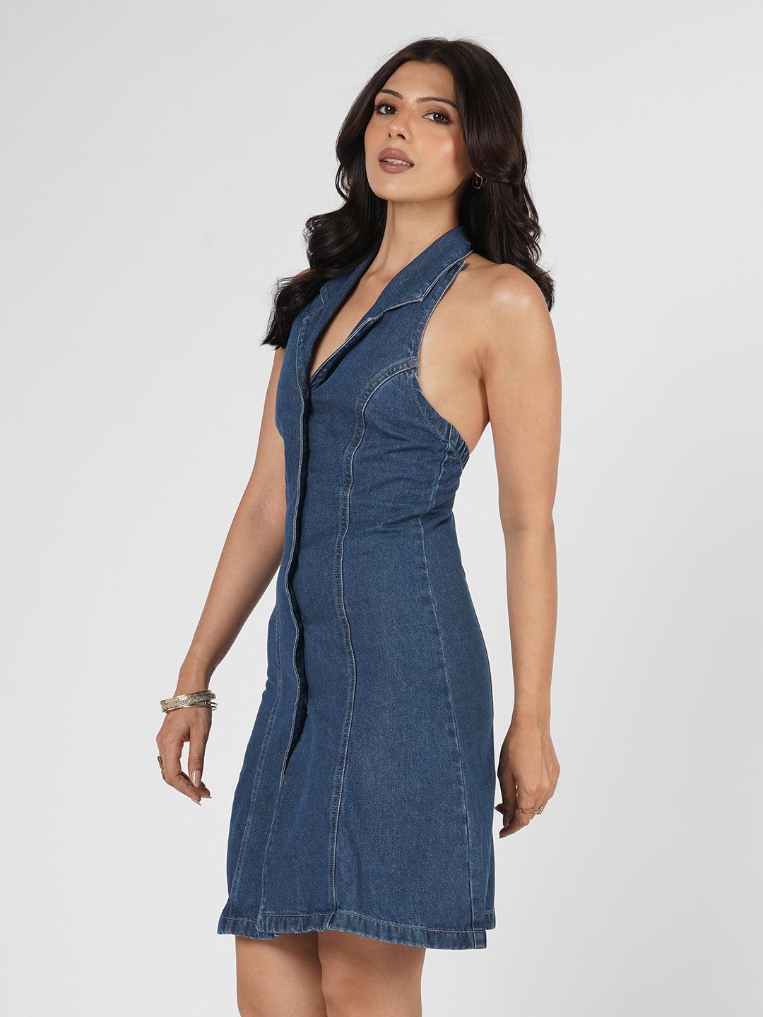 Woman wearing a blue  denim dress 