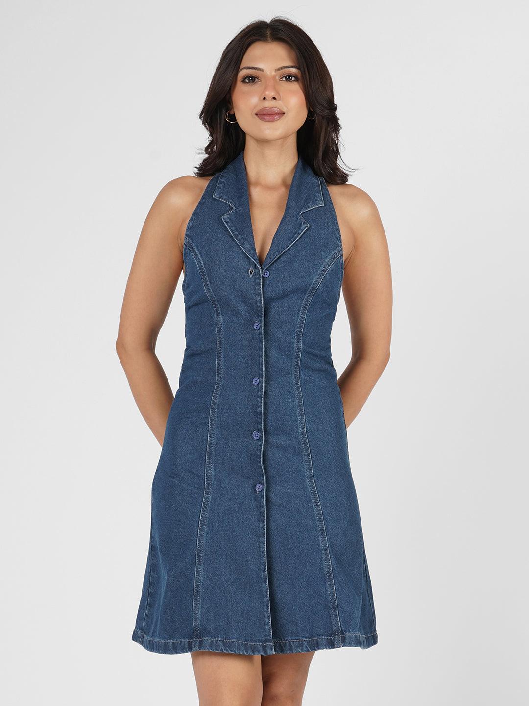 Woman wearing a blue  denim dress 