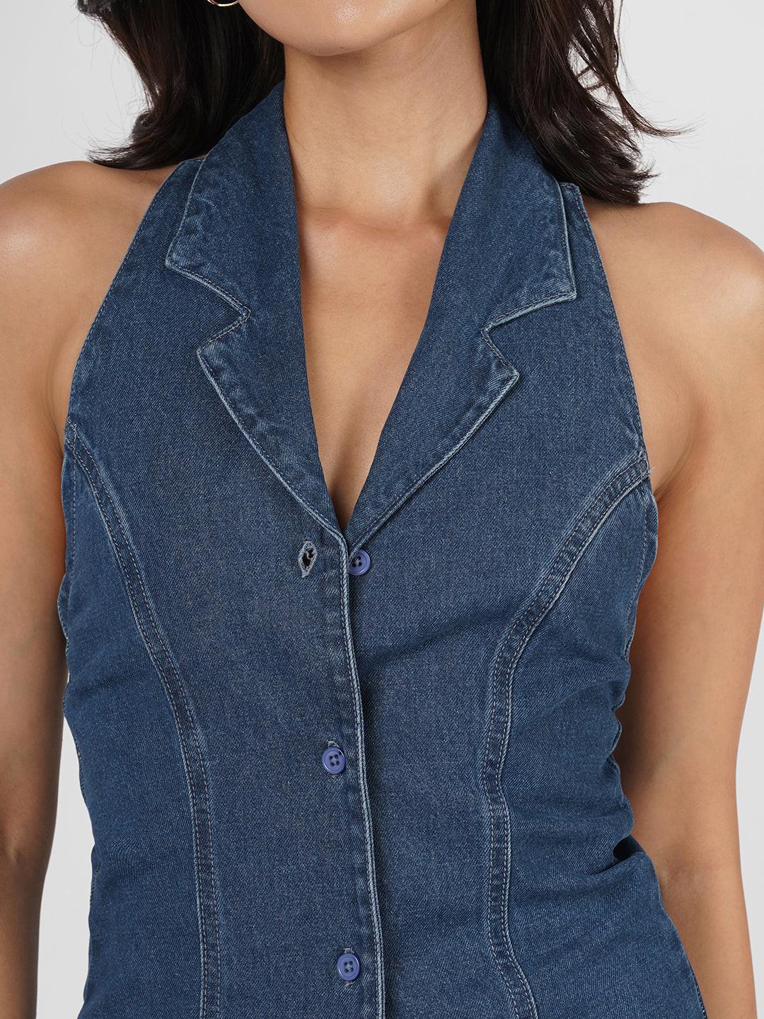 Woman wearing a blue  denim dress 